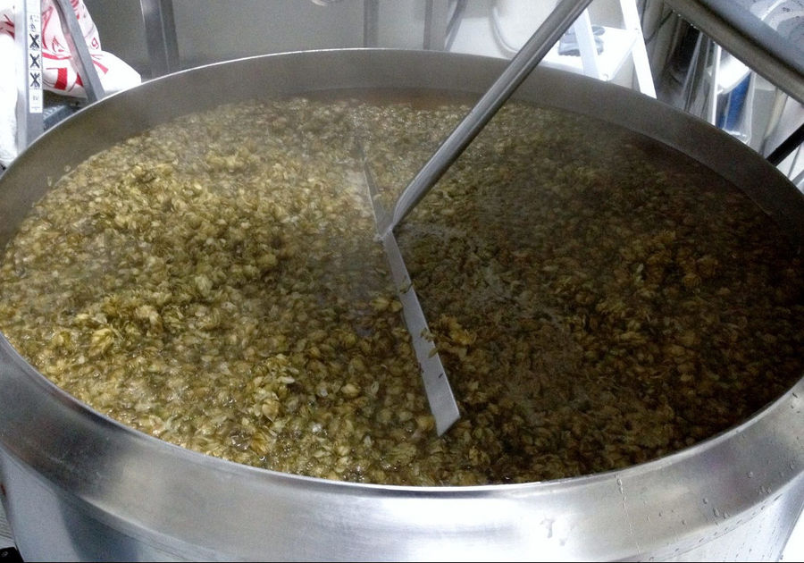 mixing barleycorns and water at 'Chios Beer' machine